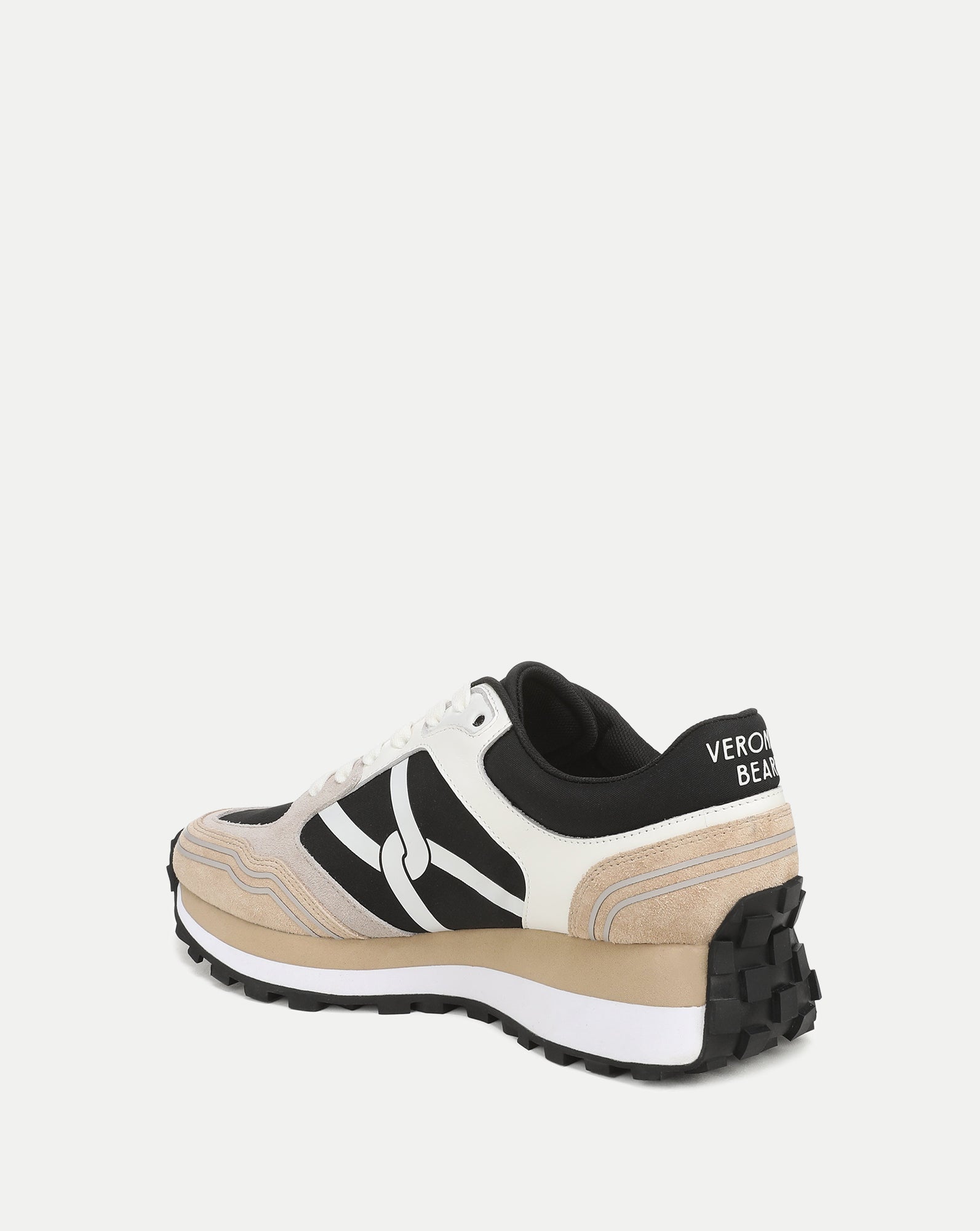 Veronica Beard Beige and white sneakers with black accents.