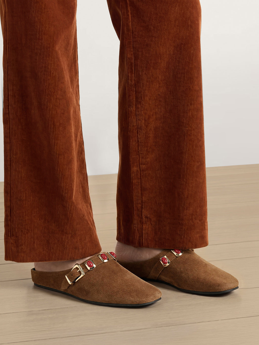 Veronica Beard Brown suede mules with gold and red gem buckle.