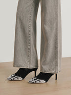 Veronica Beard Black and white snakeskin-patterned pointed-toe heels.