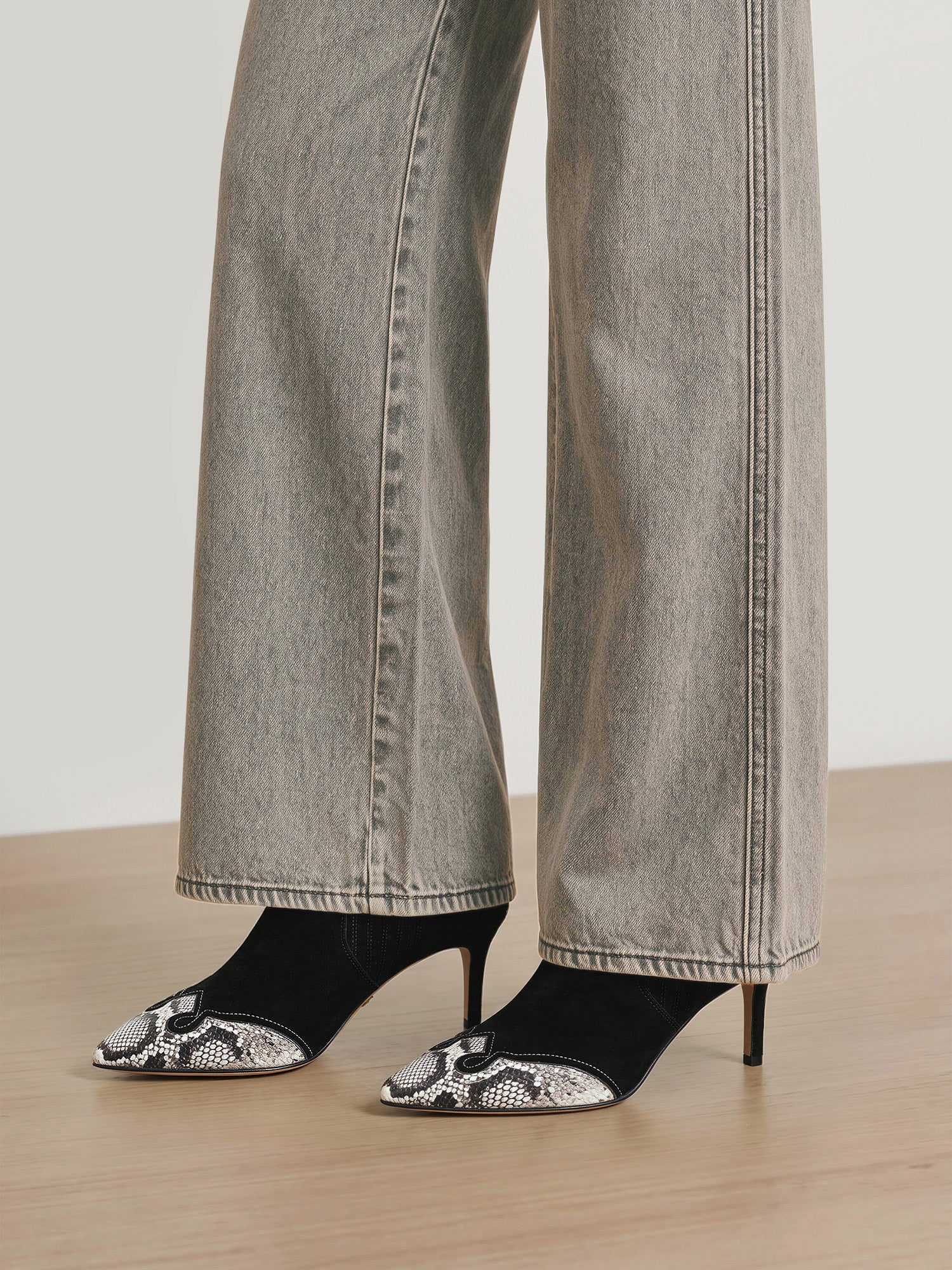 Veronica Beard Black and white snakeskin-patterned pointed-toe heels.
