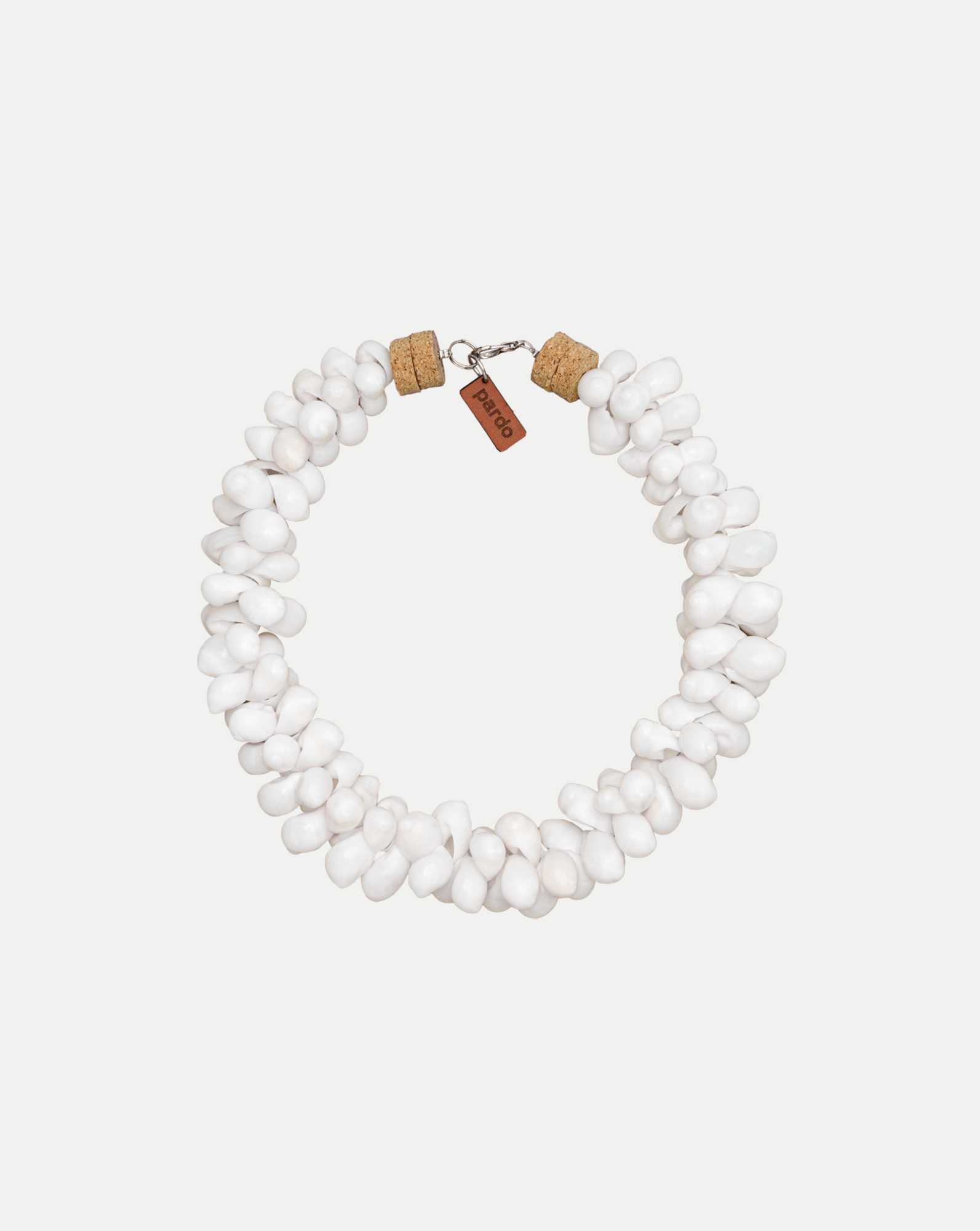Veronica Beard White shell necklace with cork ends and a brown tag.