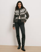 Veronica Beard Gray fair isle cardigan, black jeans, and black boots.