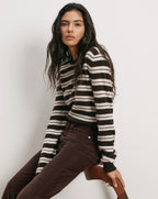 Veronica Beard Brown and white striped sweater, brown corduroy pants.