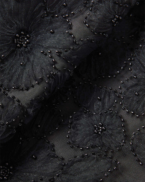 Veronica Beard Black beaded floral lace fabric.