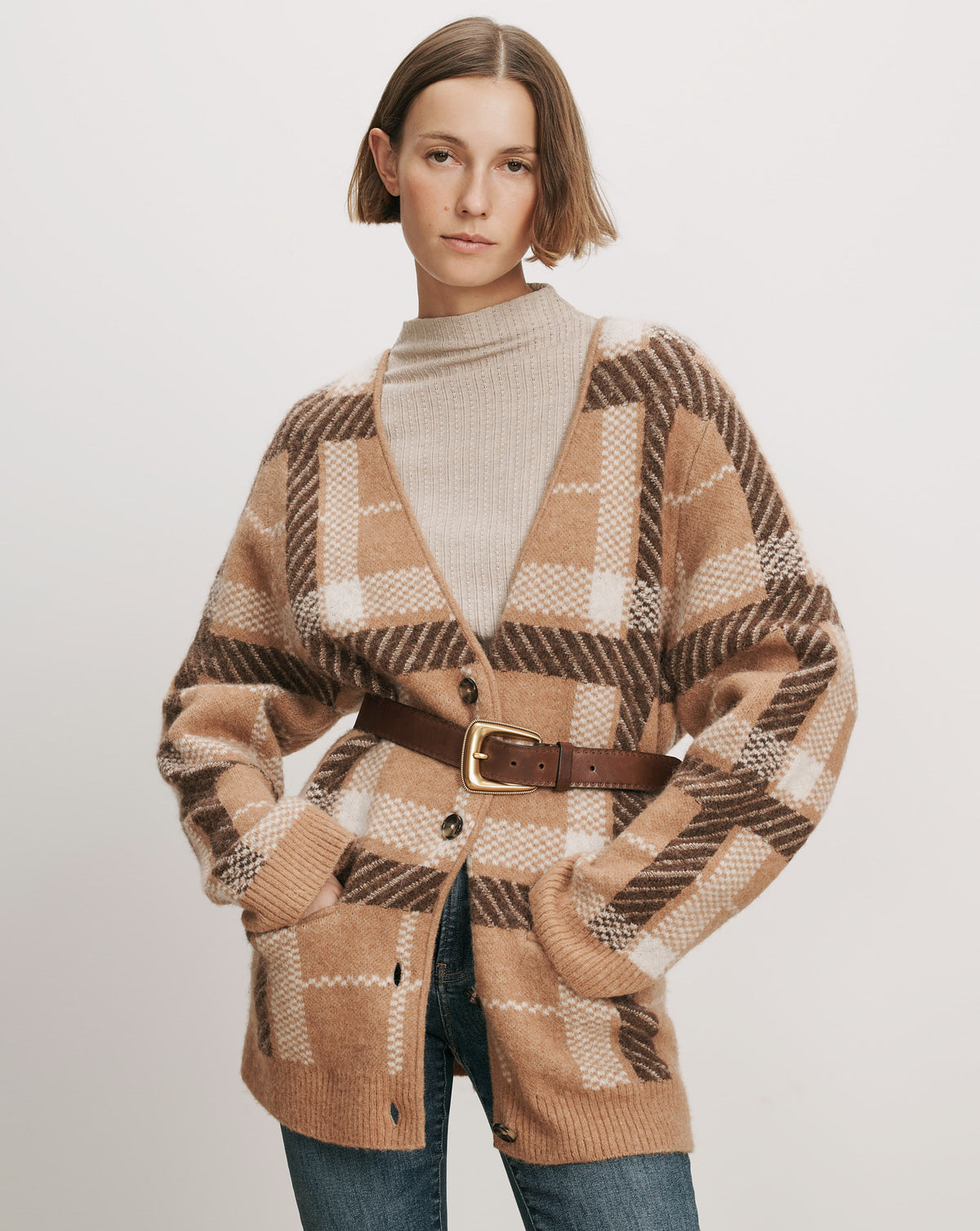 Veronica Beard Tan plaid knit cardigan with brown belt.