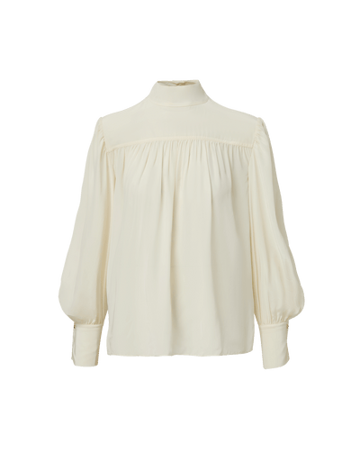 Veronica Beard Cream high-neck blouse with pleated front and puff sleeves.