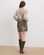 Veronica Beard Beige knit sweater, floral mini skirt, brown suede boots.