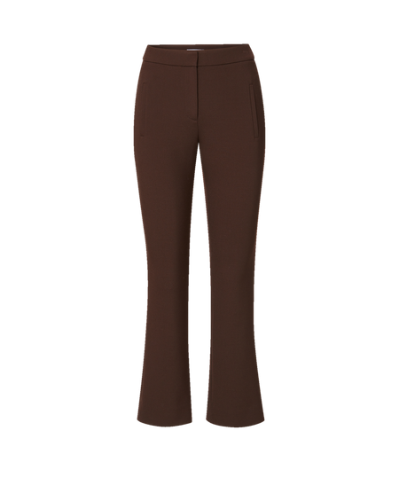 Veronica Beard Black floral sheer blouse and brown cropped trousers.