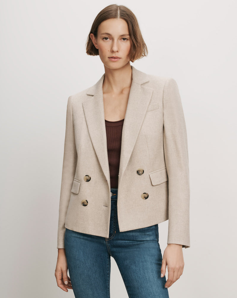 Veronica Beard Beige double-breasted blazer with notched lapels.
