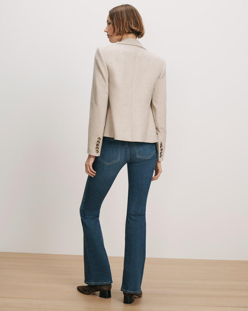 Veronica Beard Beige wool blazer, dark wash flare jeans.