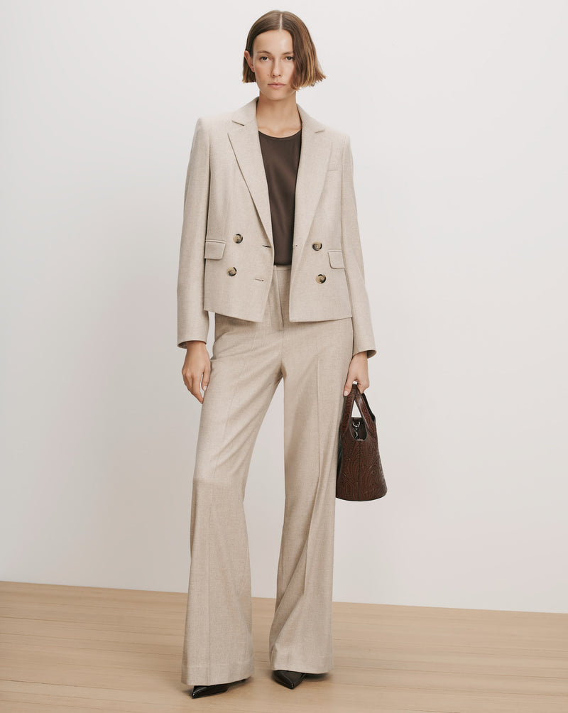 Veronica Beard Beige wool double-breasted blazer and wide-leg trousers.