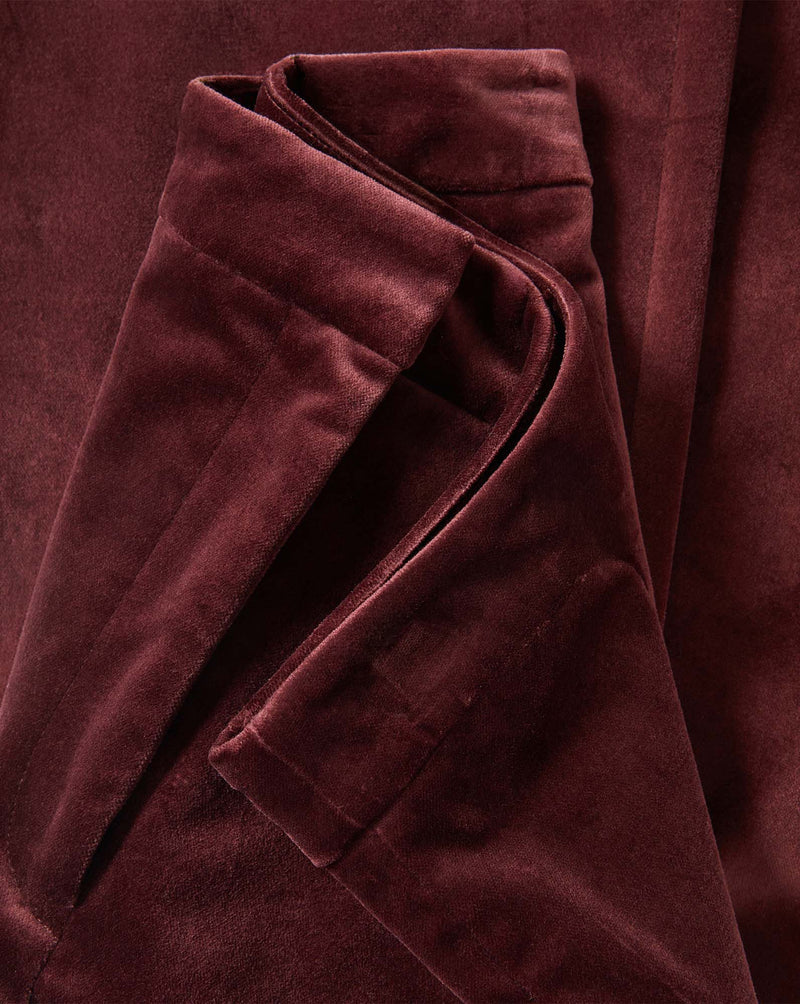 Veronica Beard Burgundy velvet trousers with a tailored waist.