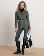 Veronica Beard Gray wool blazer, belted, with black turtleneck and jeans.