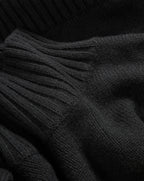 Veronica Beard Black ribbed knit sweater.