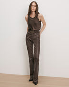 Veronica Beard Brown leather flare pants and brown sleeveless top.