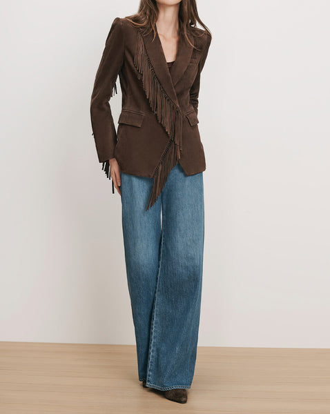 Veronica Beard Brown suede fringe blazer and wide-leg jeans.