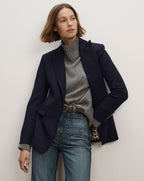 Veronica Beard Navy blue structured blazer with flap pockets.