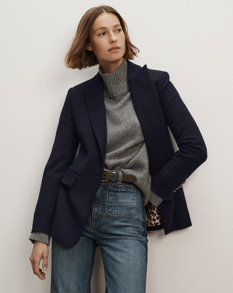 Veronica Beard Navy blue structured blazer with flap pockets.