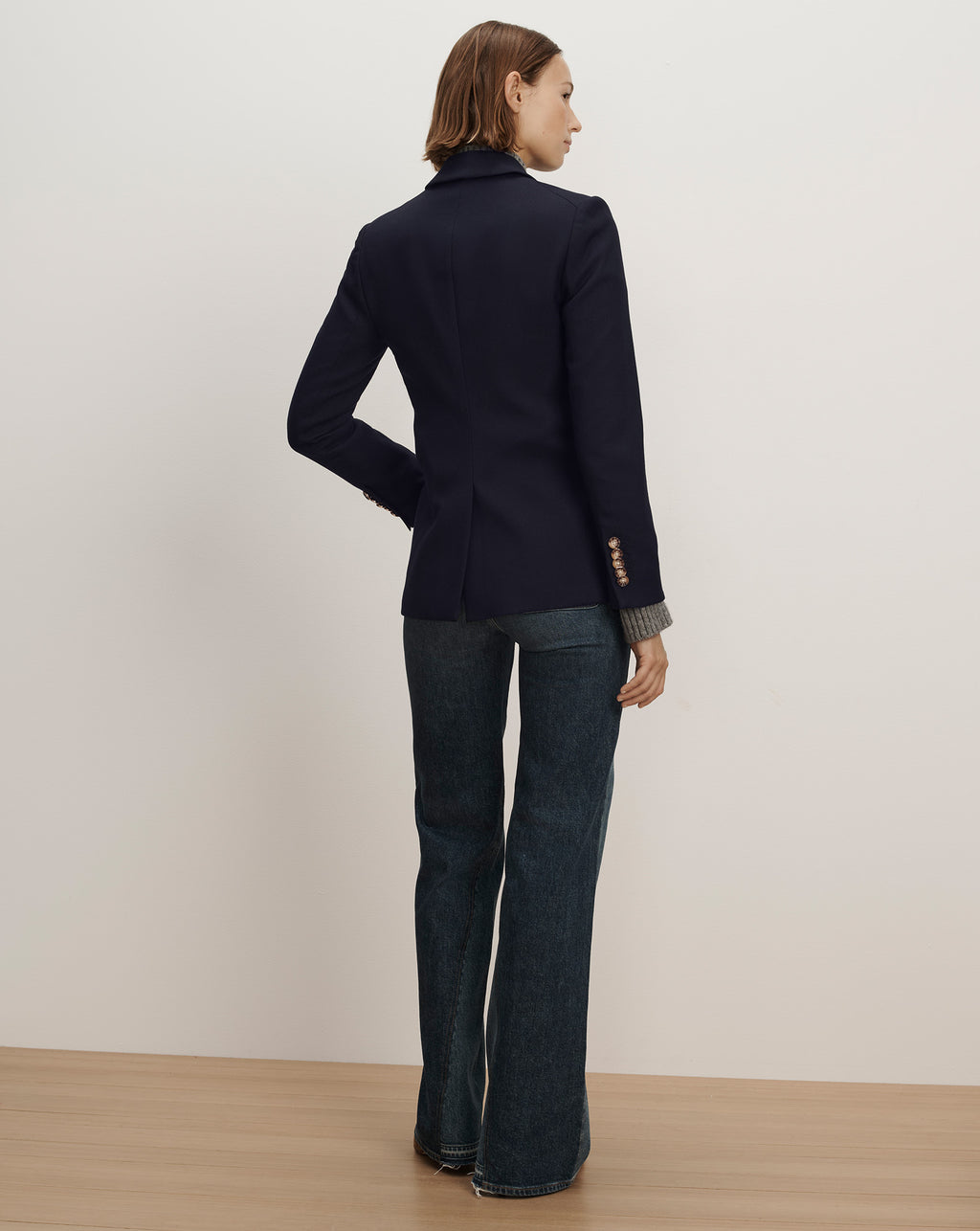 Veronica Beard Navy blue tailored blazer with brass buttons.