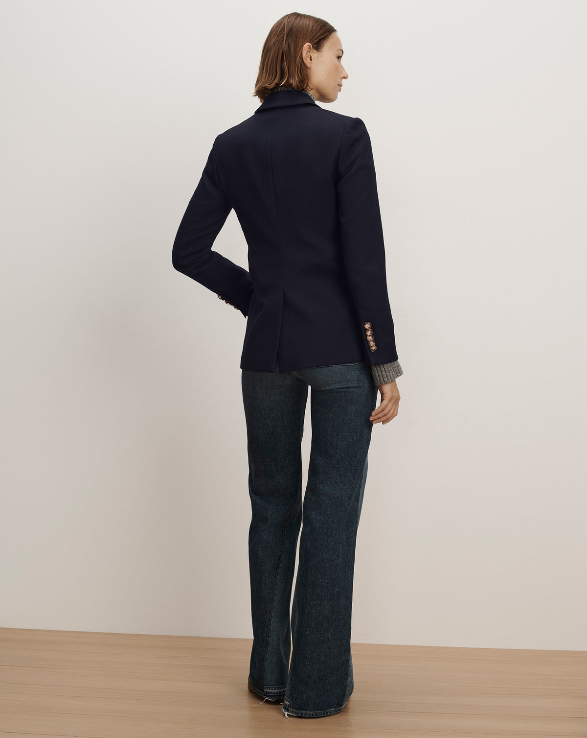 Veronica Beard Navy blue tailored blazer with brass buttons.