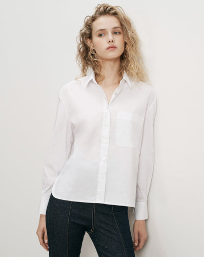 Veronica Beard White cotton button-up shirt with chest pocket.