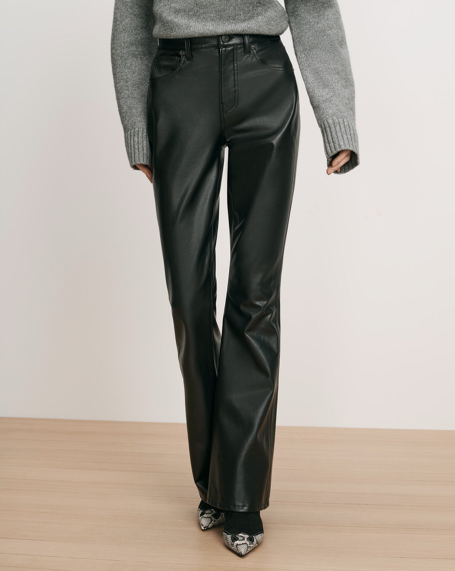 Veronica Beard Black faux leather straight-leg pants.