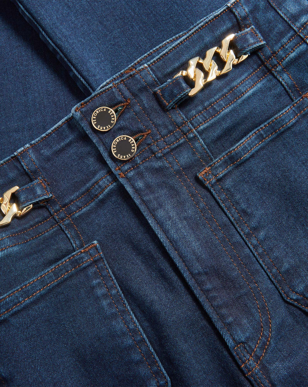 Veronica Beard Blue denim jeans with gold chain and buttons.