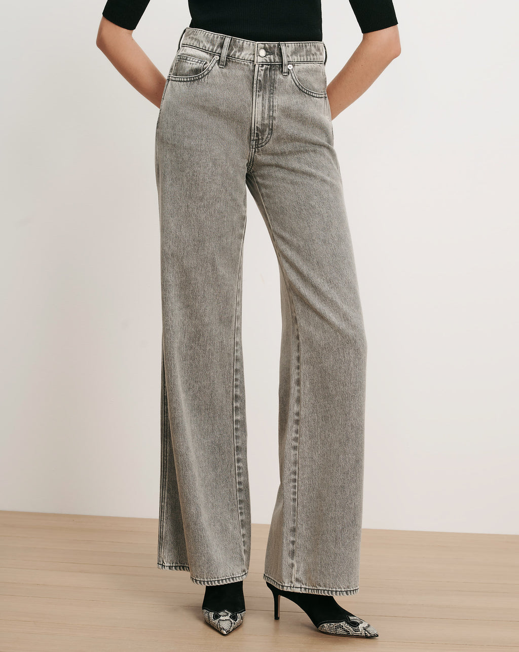 Veronica Beard Gray wide-leg jeans with a high waist.