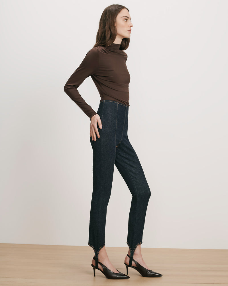 Veronica Beard Brown turtleneck top and dark wash stirrup jeans