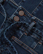 Veronica Beard Blue denim jeans with bronze buttons and stitching.