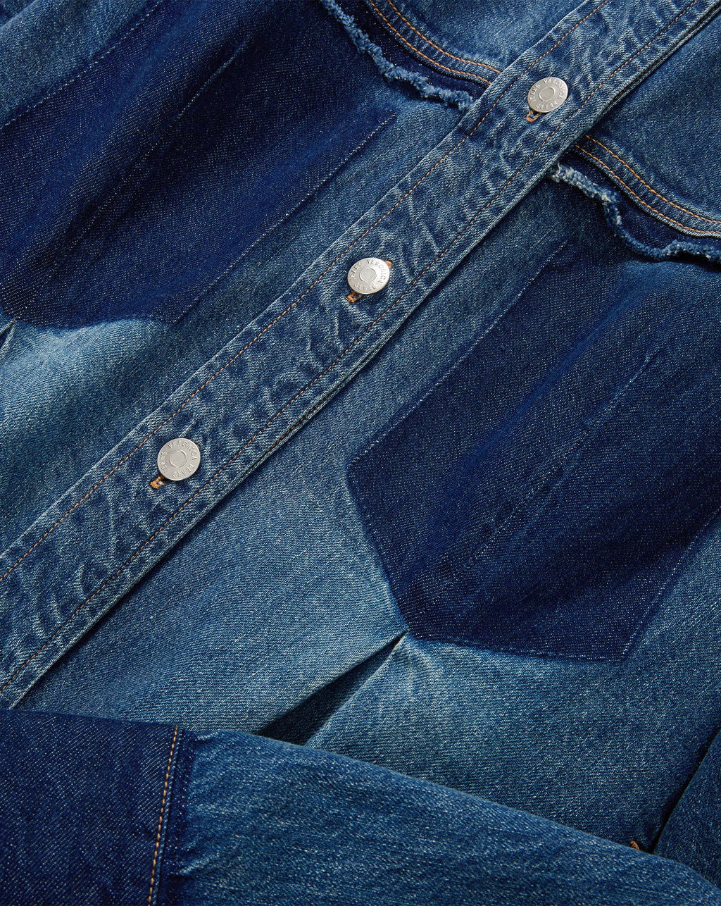 Veronica Beard Blue denim shirt with contrasting dark blue panels.