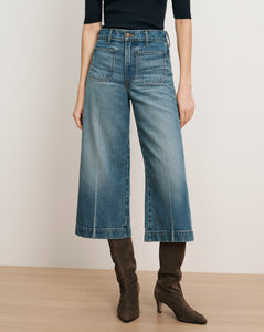 Veronica Beard Blue denim wide-leg cropped jeans with patch pockets.