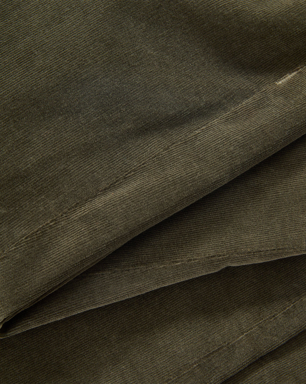 Veronica Beard Olive green corduroy fabric with textured ribbed design.