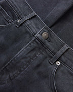Veronica Beard Black denim jeans with silver button closure.