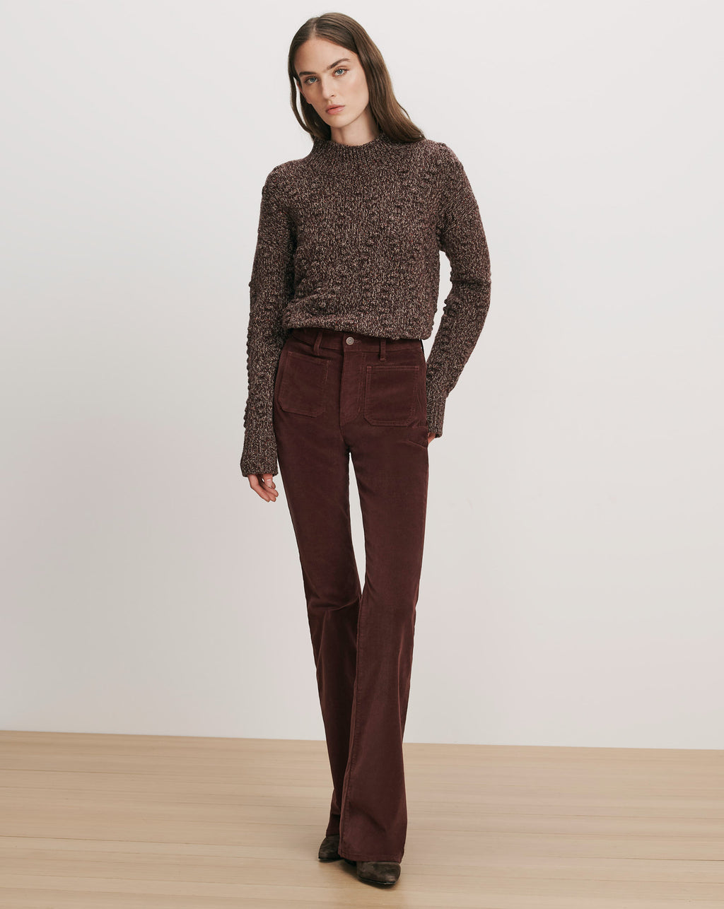 Veronica Beard Brown marled knit sweater and brown corduroy flare pants.