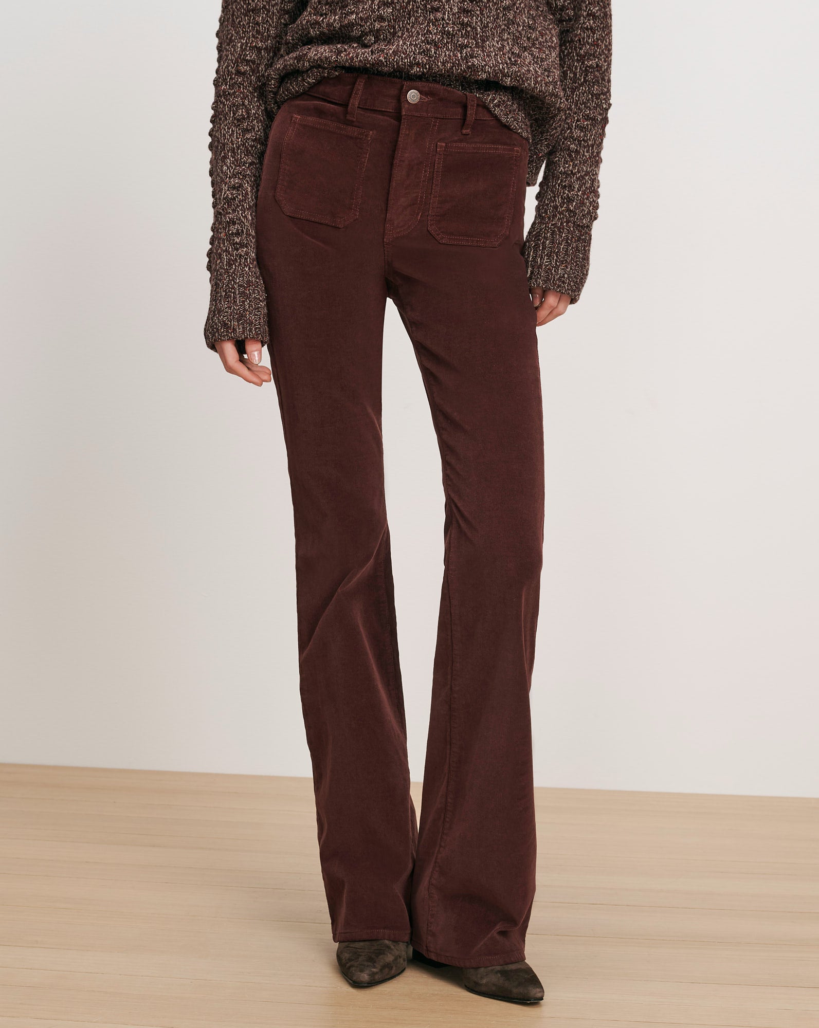 Veronica Beard Brown corduroy flare pants with patch pockets.