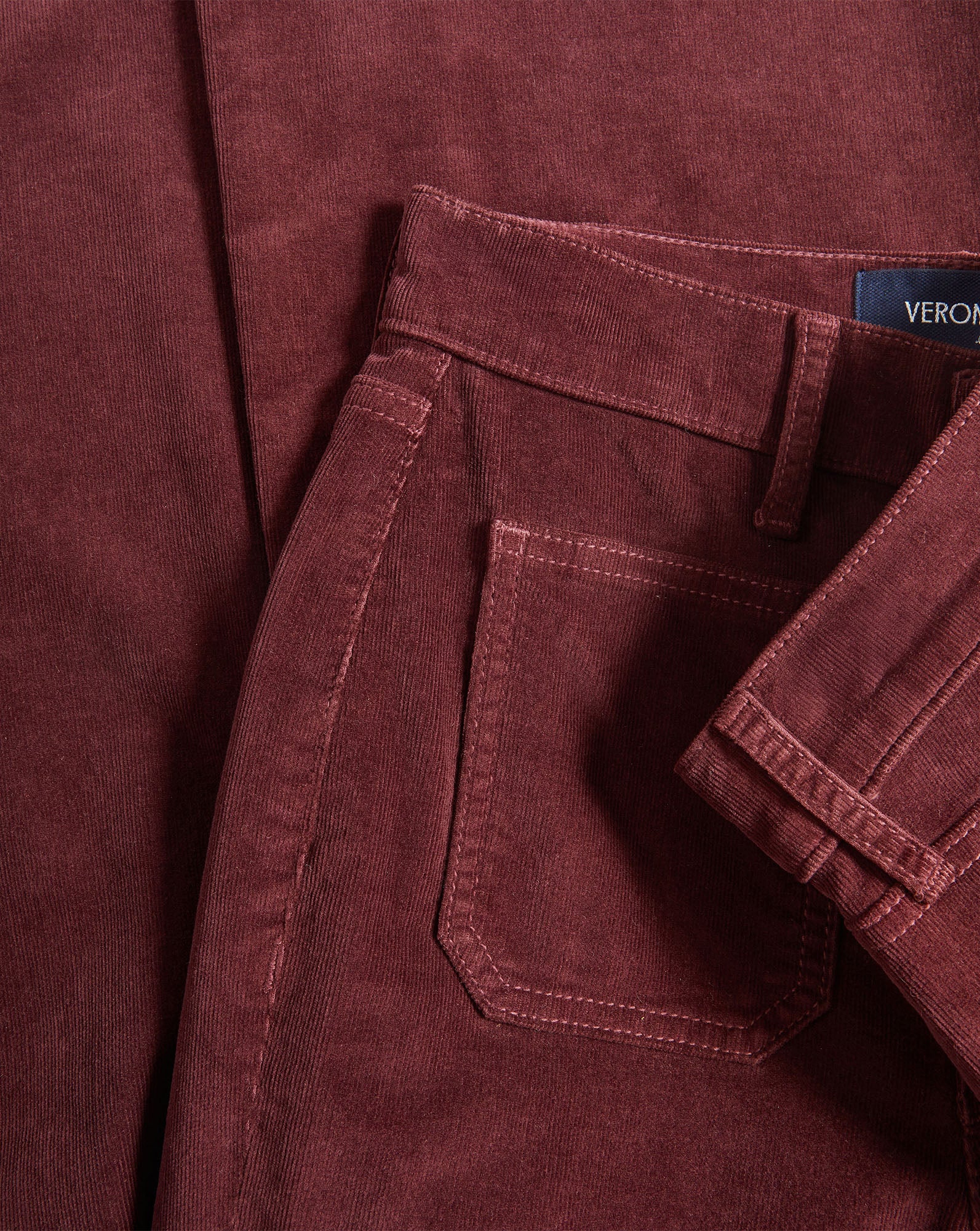 Veronica Beard Burgundy corduroy trousers with a back pocket.