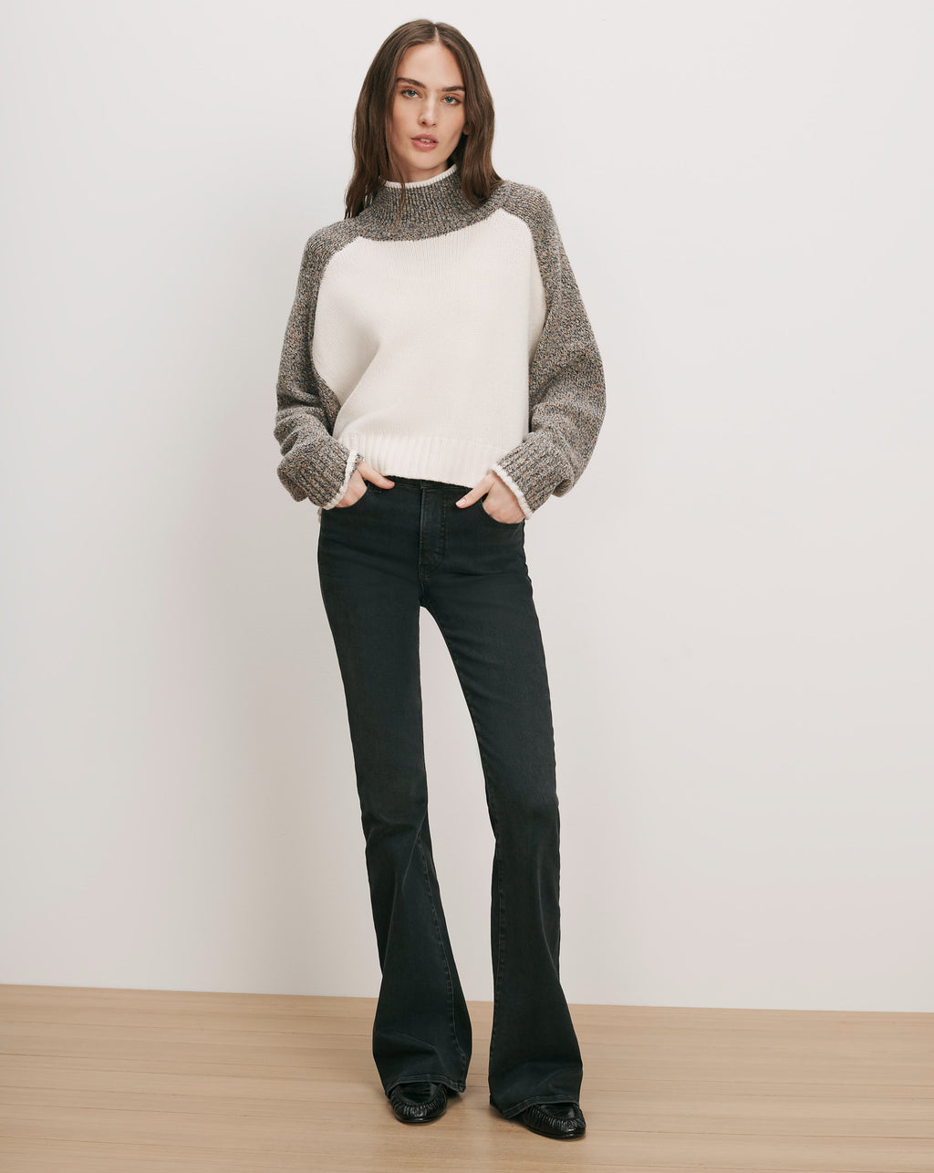 Veronica Beard White and gray knit sweater, black flared jeans