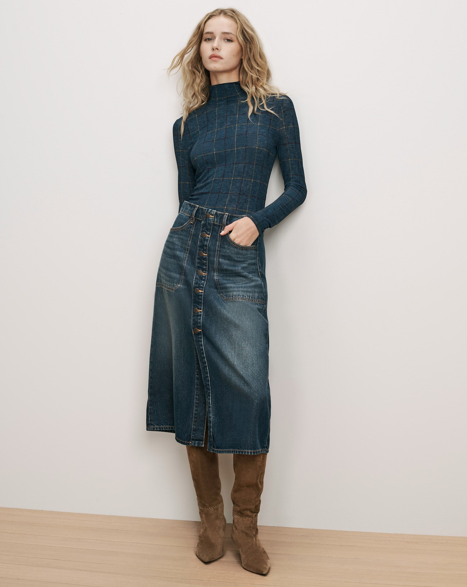 Veronica Beard Blue plaid turtleneck and denim button midi skirt.