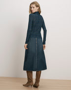Veronica Beard Blue plaid turtleneck and denim midi skirt.