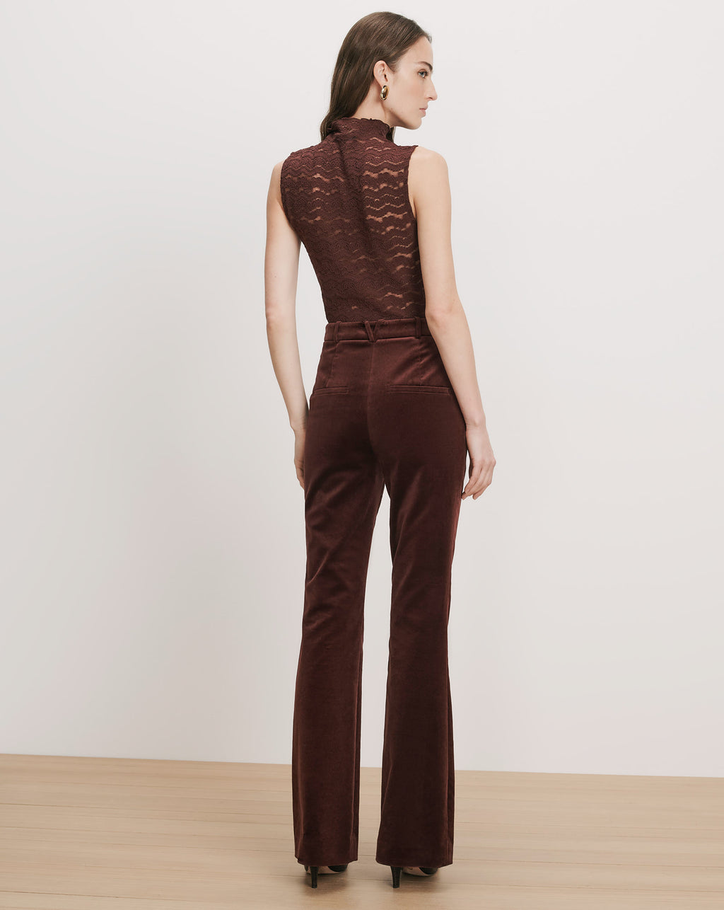 Veronica Beard Brown lace sleeveless top and velvet flared pants.