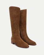Veronica Beard Brown suede knee-high boots with side buckle.