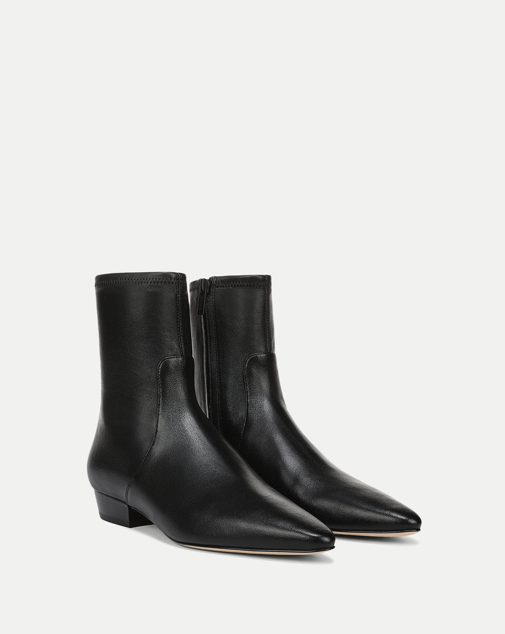 Veronica Beard Black leather ankle boots with pointed toes.