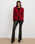Veronica Beard Red tweed jacket with black trim and pockets.