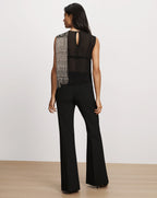 Veronica Beard Black sleeveless top with crystal fringe and trousers.