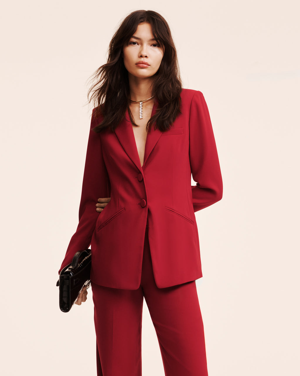 Veronica Beard Red pantsuit featuring structured single-breasted blazer.
