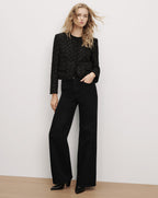 Veronica Beard Black tweed jacket and wide-leg trousers.
