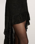 Veronica Beard Black and gold polka dot high-low skirt.
