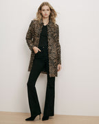 Veronica Beard Brown zebra print cotton jacket, black jeans.