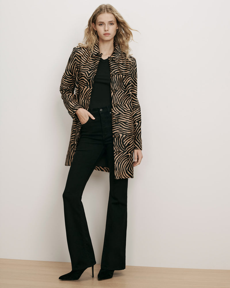 Veronica Beard Brown zebra print cotton jacket, black jeans.